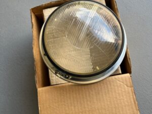 Koplamp unit 110